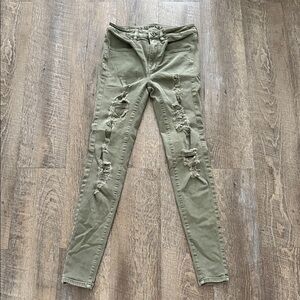 American Eagle Outfitters Olive Distressed Super Stretch Skinny Jeans